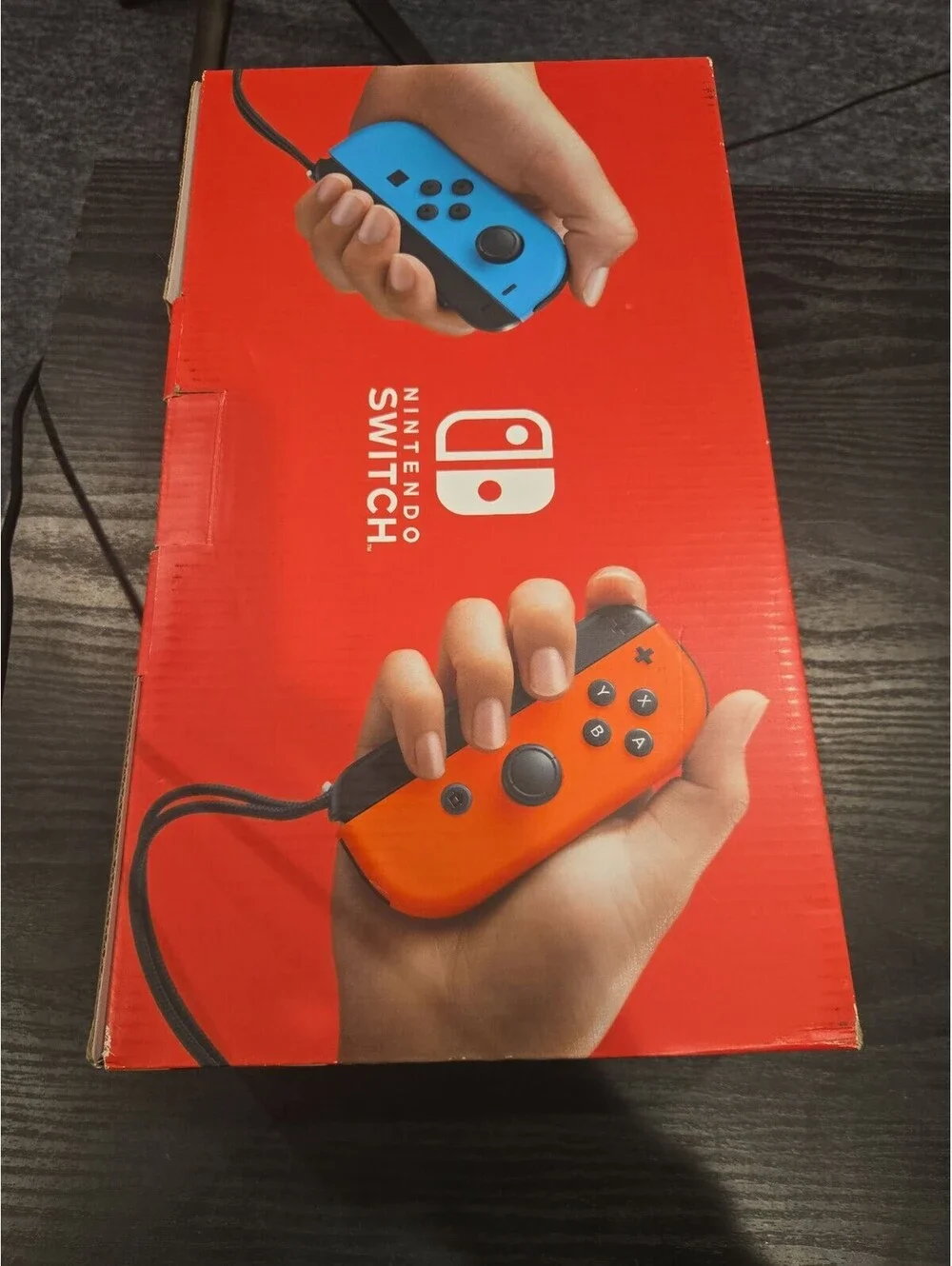 Nintendo Switch V2 Console Box with Neon Blue & Red Joy-Con